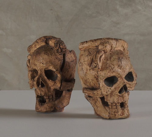2 CARVED WOOD SKULL FORM ARCHITECTURAL ORNAMENTS